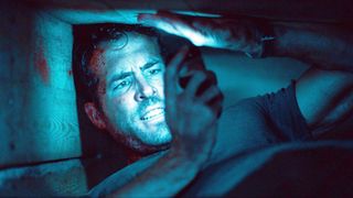 Ryan Reynolds as Paul Conroy in "Buried"