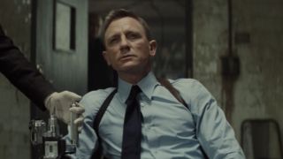 Daniel Craig gets injected with smart blood while sitting in Spectre.