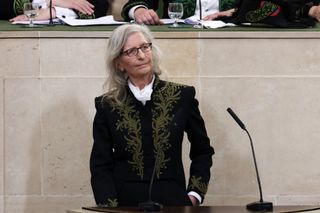 PARIS, FRANCE - MARCH 20: Annie Leibovitz speaks during her intake ceremony into the Académie des Beaux-Arts on March 20, 2024 in Paris, France.The American photographer Annie Leibovitz is installed as a foreign associate member of the Académie des Beaux-Arts by her colleague Sebastiao Salgado, member of the photography section. (Photo by Pierre Suu/Getty Images)