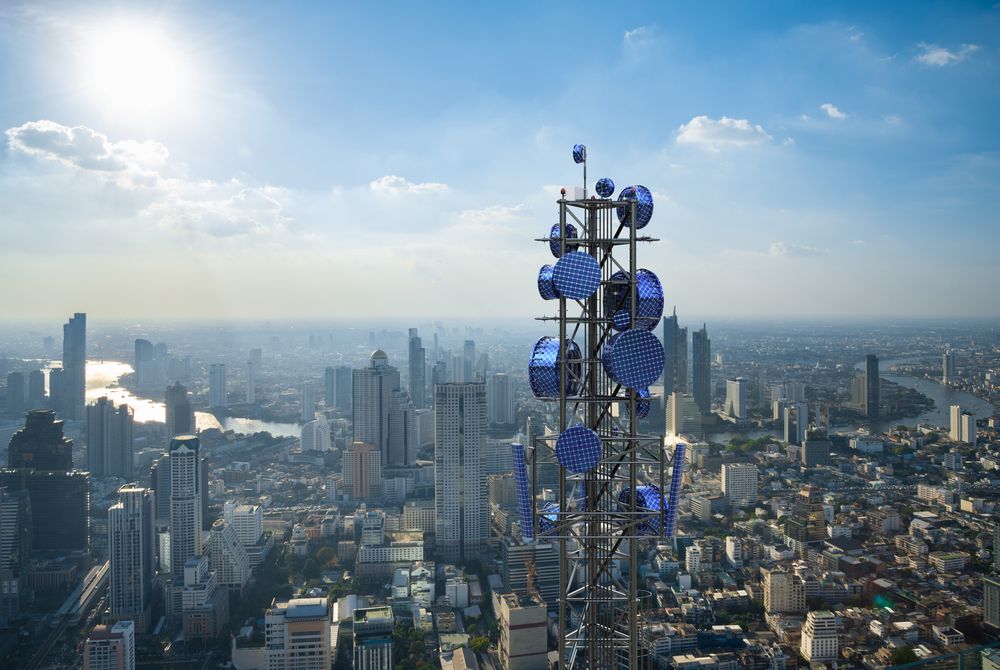 A futuristic 5G mast in the middle of a city