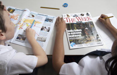 Two children working at a desk