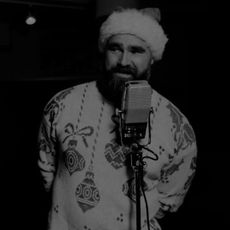 Kylie Kelce and Jason Kelce singing in the music video for holiday song "Loud Little Town" 