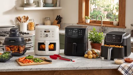 Selection of air fryers on a kitchen countertop