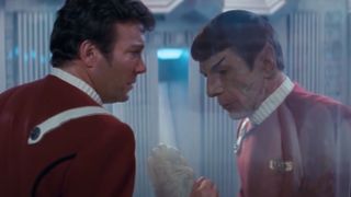 Still from the movie Star Trek II: The Wrath of Khan. Here we see Spock trapped inside the radiation room, dying, and Kirk saying a tearful goodbye.