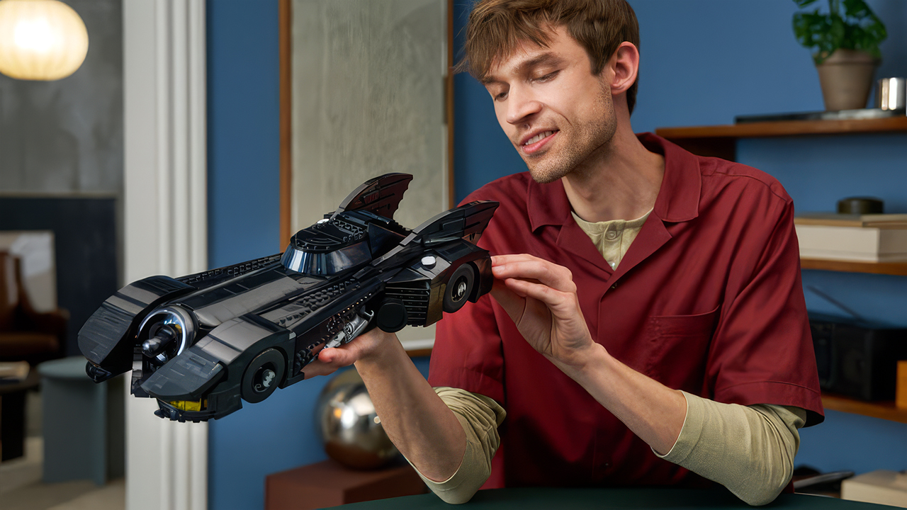 Lego Batman Returns Batmobile held by adult male builder