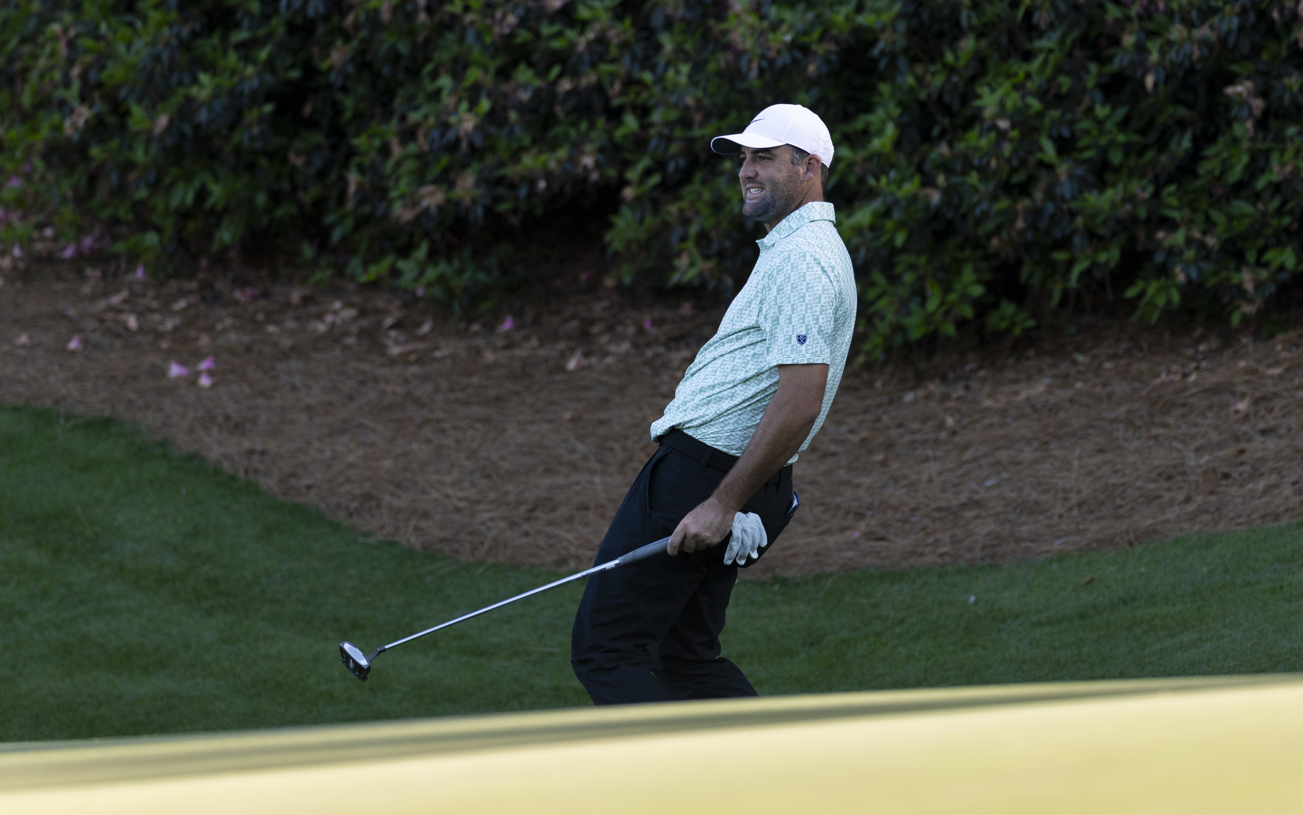 Scottie Scheffler reacts on the No. 13 green during the first round of the Masters at Augusta National Golf Club
