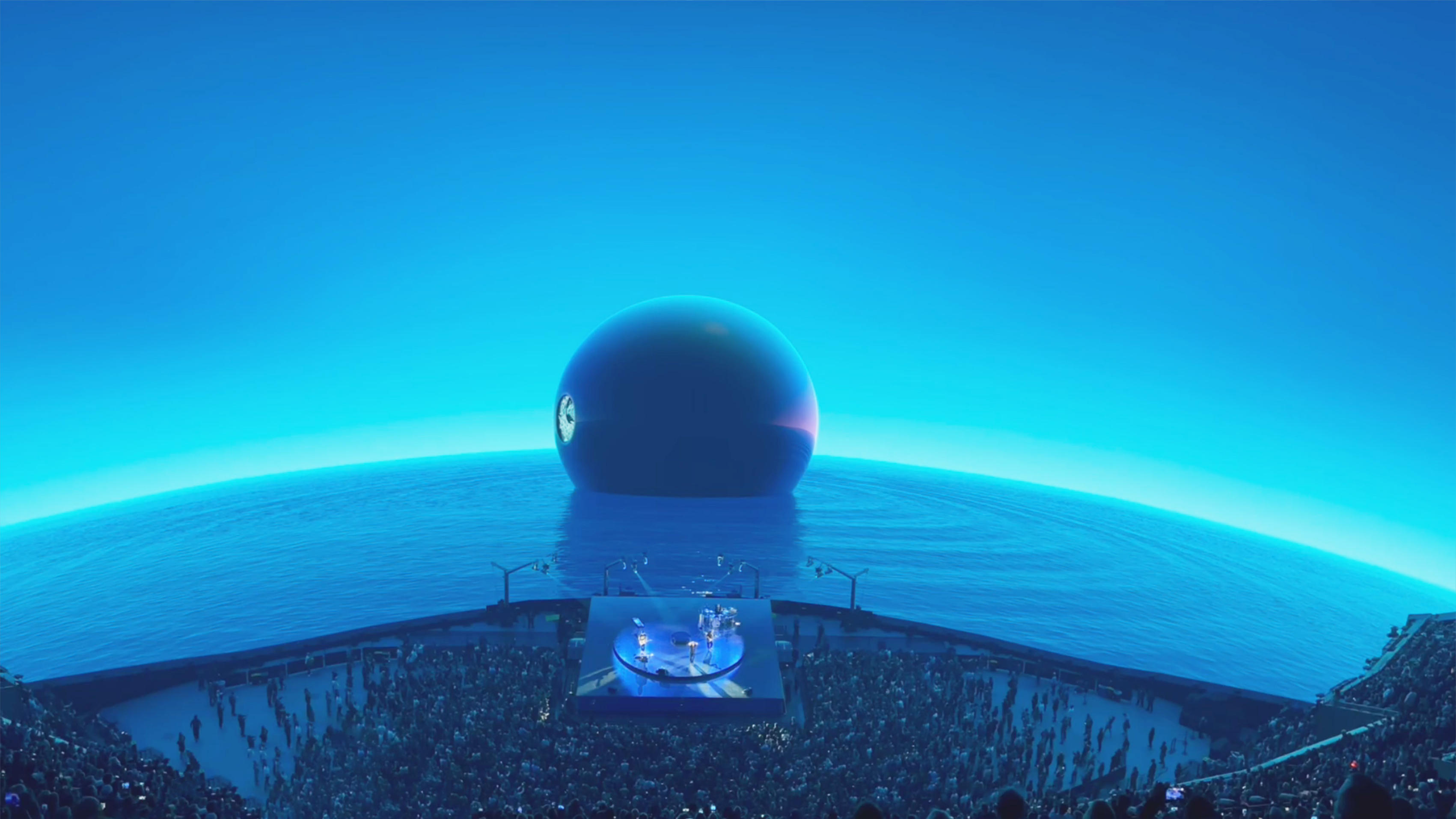 A blue orb sits in water on the massive LED screen inside the Sphere.