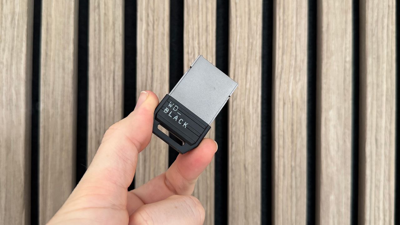 The WD Black C50 being held by a reviewer