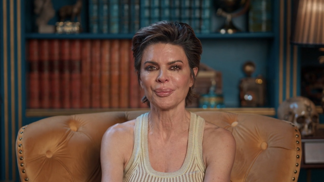 Rinna crying in a confessional on The Traitors