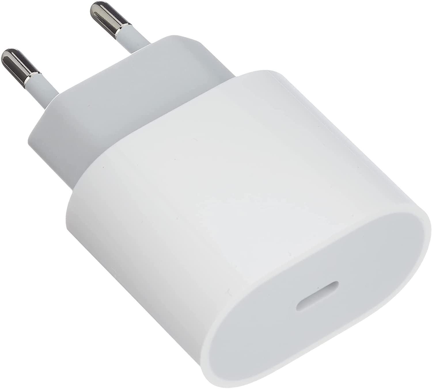 Et Apple 20 W USB-C Power Adapter mot hvit bakgrunn