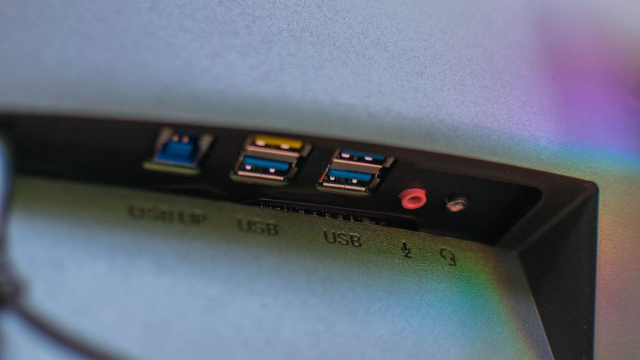 A closeup of the Porsche Design AOC Agon PD27's rear USB ports
