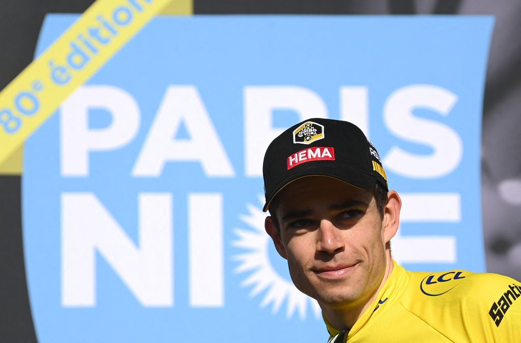 JumboVismas Belgian rider Wout Van Aert celebrates his overall leader yellow jersey on the podium at the end of the 4th stage of the 80th edition of the Paris Nice cycling race 134 km time trial stage between Domerat and Montlucon on March 9 2022 Photo by FRANCK FIFE AFP Photo by FRANCK FIFEAFP via Getty Images