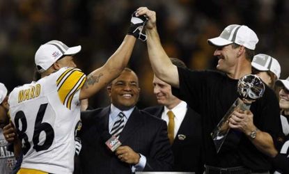 Pittsburgh Steelers coach Bill Cower (right and Hines Ward high-five after beating the Seattle Seahawks in the 2006 Super Bowl.