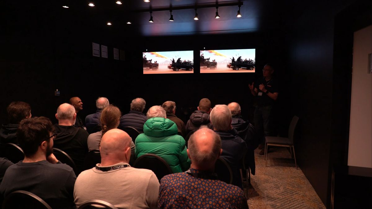 What Hi-Fi? Bristol 2024 demo with a crowd watching two TV&#039;s placed side by side