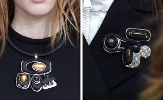 Retro futurism with brooches made from Cabochon stones and pendant necklaces composed of Cabochon and black metal