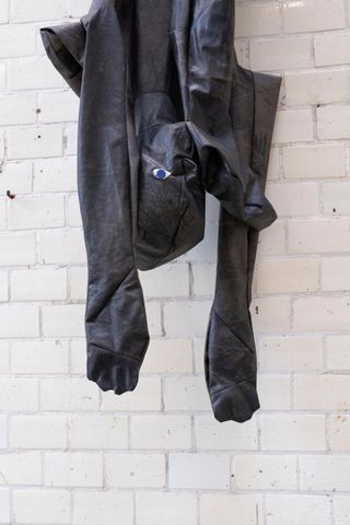'Fair Game' at Kindl, Berlin features gimp suit-like bodies, made from black latex-painted calico and embroidered with body parts Alexandra Bircken