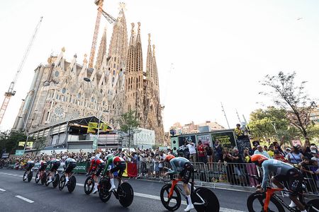 Netcompany INEOS team riders cycle past the Sagrada Familia Basilica during the 1st stage of the 113th edition of the Tour de France cycling race, a 19,6 km team time trial stage in and around Barcelona in northeastern Spain, on July 4, 2026. (Photo by Josep LAGO / AFP)
