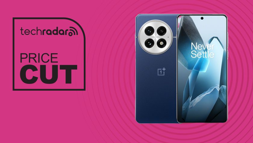 The OnePlus 13 on a pink background. Text reads: Price Cut