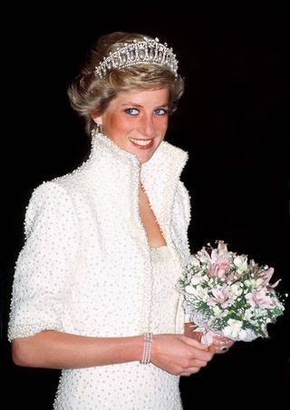 hong kong november 10 princess of wales in hong kong wearing an outfit described as the elvis look designed by fashion designer catherine walker tour dates 7 10 november exact day date not certain photo by tim graham photo library via getty images