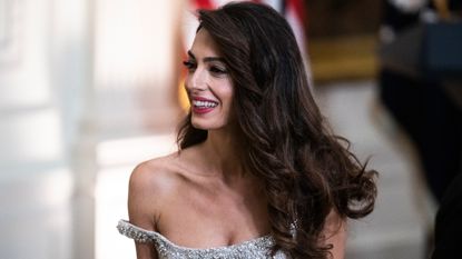 Amal Clooney, the wife of honoree George Clooney, attends the Kennedy Center Honorees reception in the East Room of the White House on Sunday, December 4, 2022. The honorees were George Clooney, Amy Grant, Gladys Knight, Tania Leon, and the band members of U2, Bono, The Edge, Adam Clayton, and Larry Mullen, Jr. 