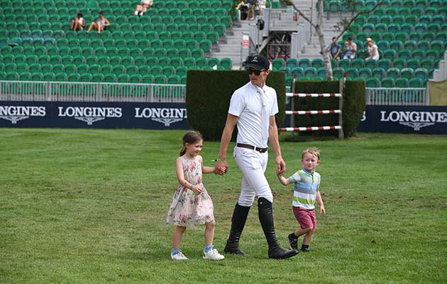 William Whitaker walking the course of The Bunn Leisure Trophy with some help from Oliver and Isabella Whitaker, to ensure he has the right stride, during The Longines FEI Jumping Nations Cup&amp;trade; of Great Britain at the BHS Royal International Horse Show held at the Hickstead Show ground near Haywards Heath in West Sussex, in the UK between 25-29th July 2018