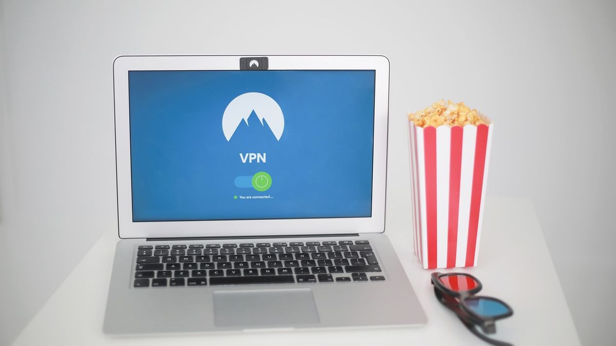 Active VPN connection on a laptop screen with popcorn and 3D glasses on the side