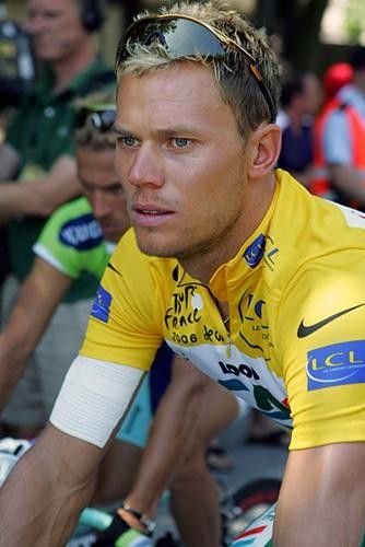 Thor Hushovd (Credit Agricole) with bandage still in place, rolls to sign in.