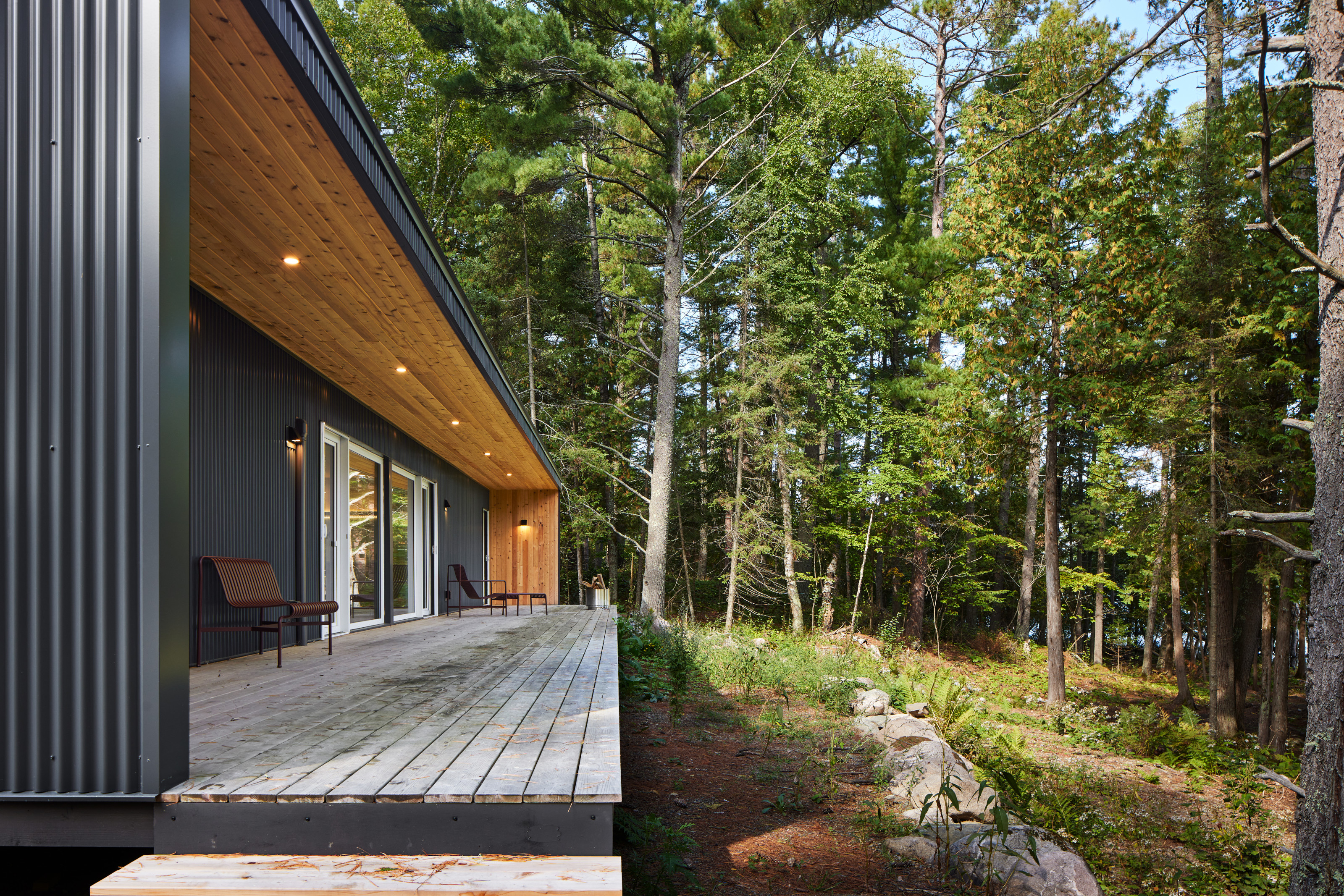 The external deck overlooks the lake