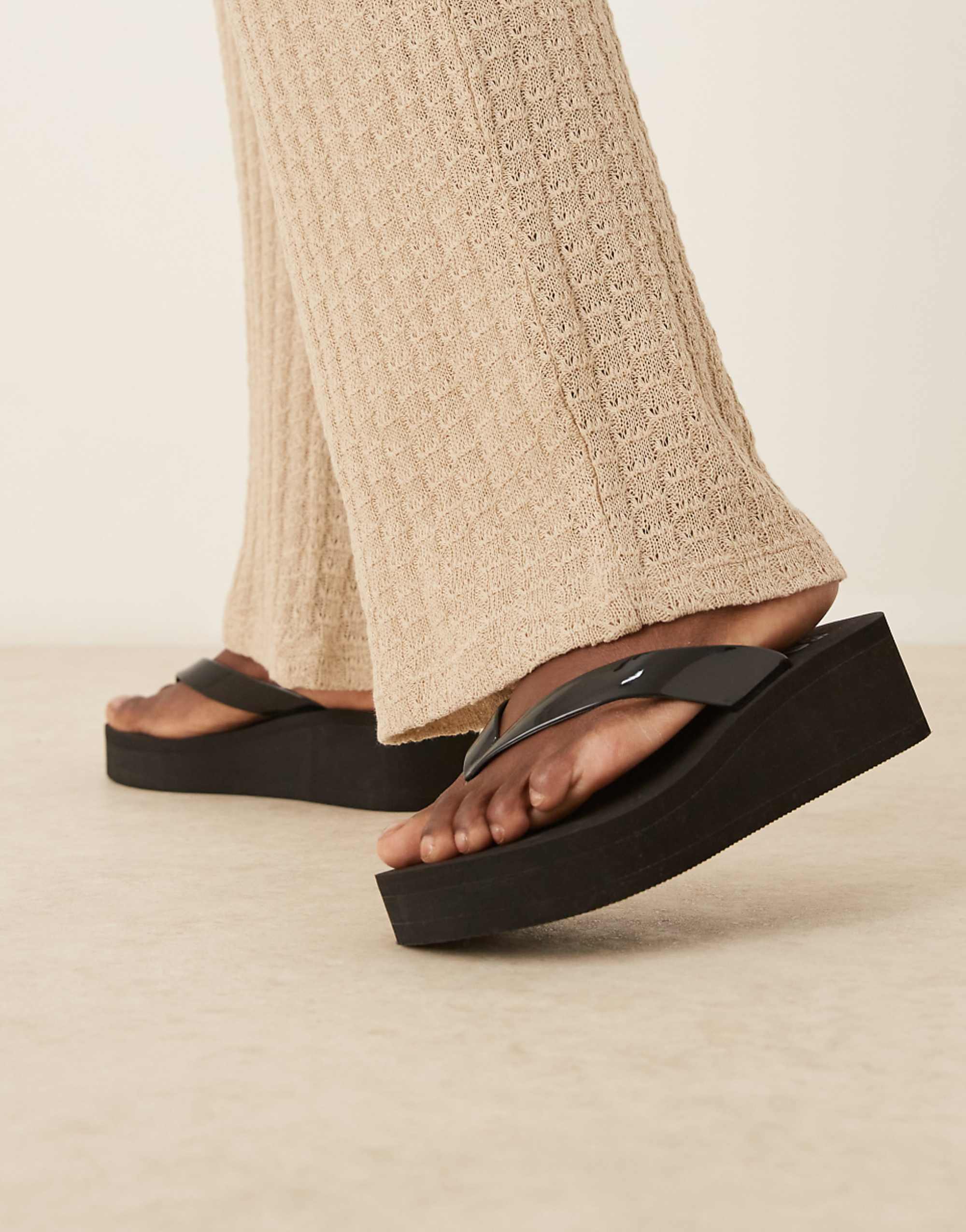 ASOS Design Tigerlily Toe Thong Flatform Wedges in Black