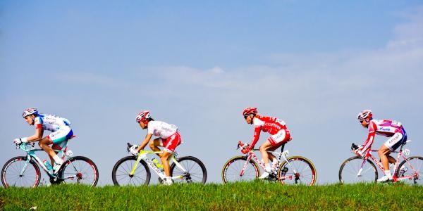 The day's break working hard as it rolls through the flat farmland outside of Milano.