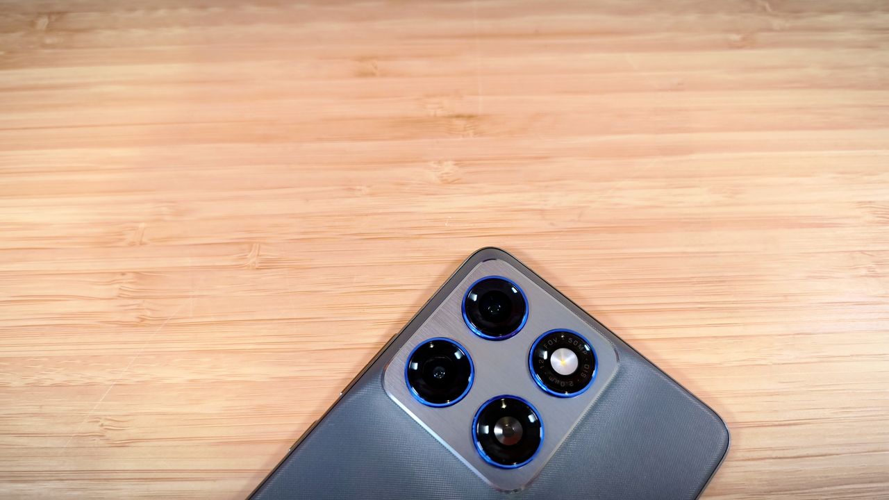 Motorola Edge 70 phone on a wooden desk
