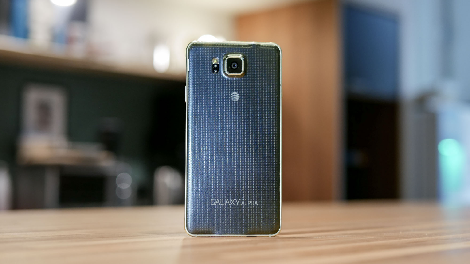 Samsung Galaxy Alpha held in hand.