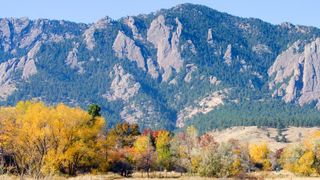 Boulders flatirons with the fall colors in the foreground