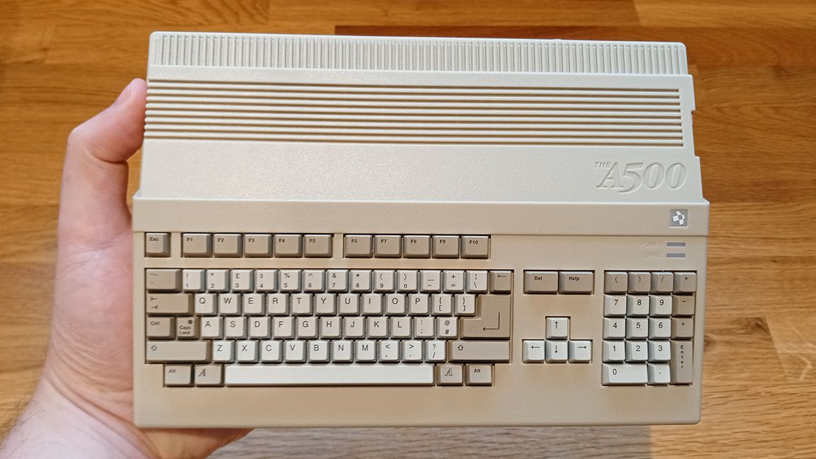 A500 Mini review, a photo of the Amiga 500 mini being held