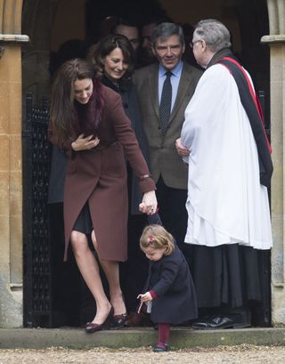 Catherine, Duchess of Cambridge, Princess Charlotte of Cambridge, Carole Middleton and Michael Middleton attend a Christmas Day service at St. Marks Church