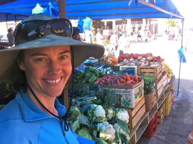 Mary McConneloug stocking up on supplies at the Pichilemu farmers market