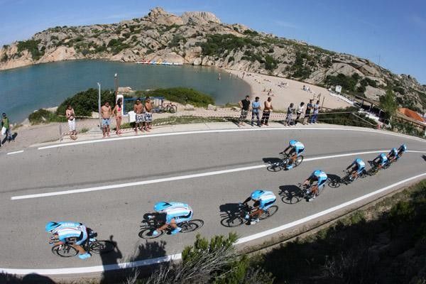 Team Milram in fine formation passing one of Sardinia's beaches