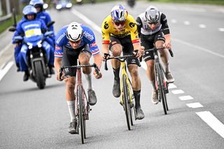 Belgian Wout van Aert of Team JumboVisma Slovenian Tadej Pogacar of UAE Team Emirates and Dutch Mathieu van der Poel of AlpecinDeceuninck compete during the E3 Saxo Bank Classic one day cycling race 2041km from and to Harelbeke on March 24 2023 Photo by JASPER JACOBS Belga AFP Belgium OUT Photo by JASPER JACOBSBelgaAFP via Getty Images
