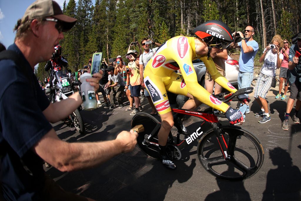 Rohan Dennis in the yellow jersey rides to the stage 5 victory