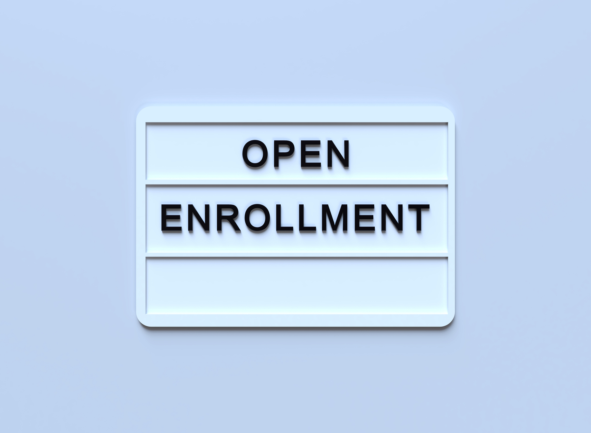 &amp;apos;&amp;apos;Open Enrollment&amp;apos;&amp;apos; Written White Lightbox Sitting On Blue Background