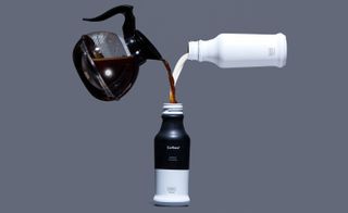 Coffee and additives being blended in Coffiest bottle