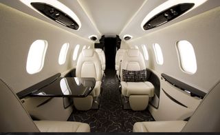 White seats inside private jet