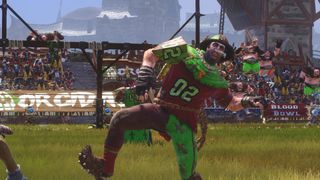 A Bretonnian peasant takes a swing in Blood Bowl