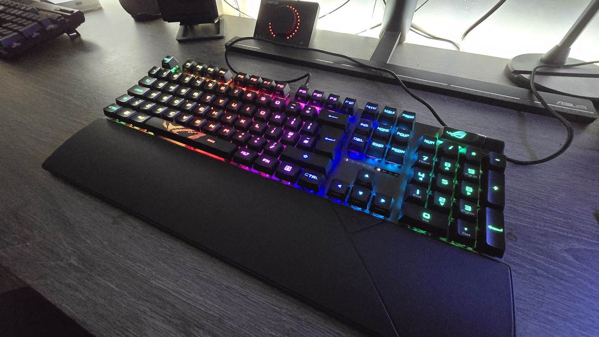Shots of the Asus ROG Strix Scope II RX gaming keyboard in use