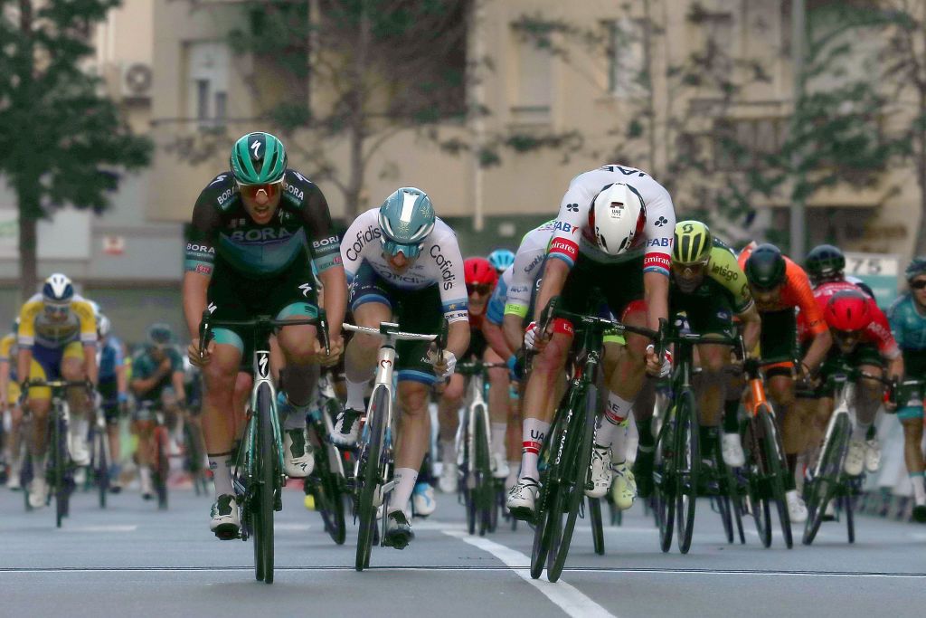 ROQUETAS DE MAR SPAIN FEBRUARY 16 Sprint Arrival Pascal Ackermann of Germany and Team Bora Hansgrohe Alexander Kristoff of Norway and UAE Team Emirates Elia Viviani of Italy and Team Cofidis Solutions Credits Luka Mezgec of Slovenia and Team Mitchelton Scott during the 33rd Clsica de Almera 2020 a 1876km stage from Roquetas de Mar to Roquetas de Mar ClasicaAlmeria on February 16 2020 in Roquetas de Mar Spain Photo by Gonzalo Arroyo MorenoGetty Images