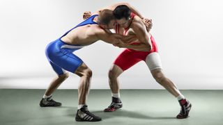 Two men wrestling
