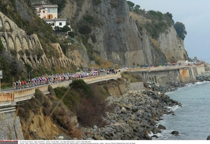 The Milan-San Remo peloton rolls along the Ligurian Sea coastline