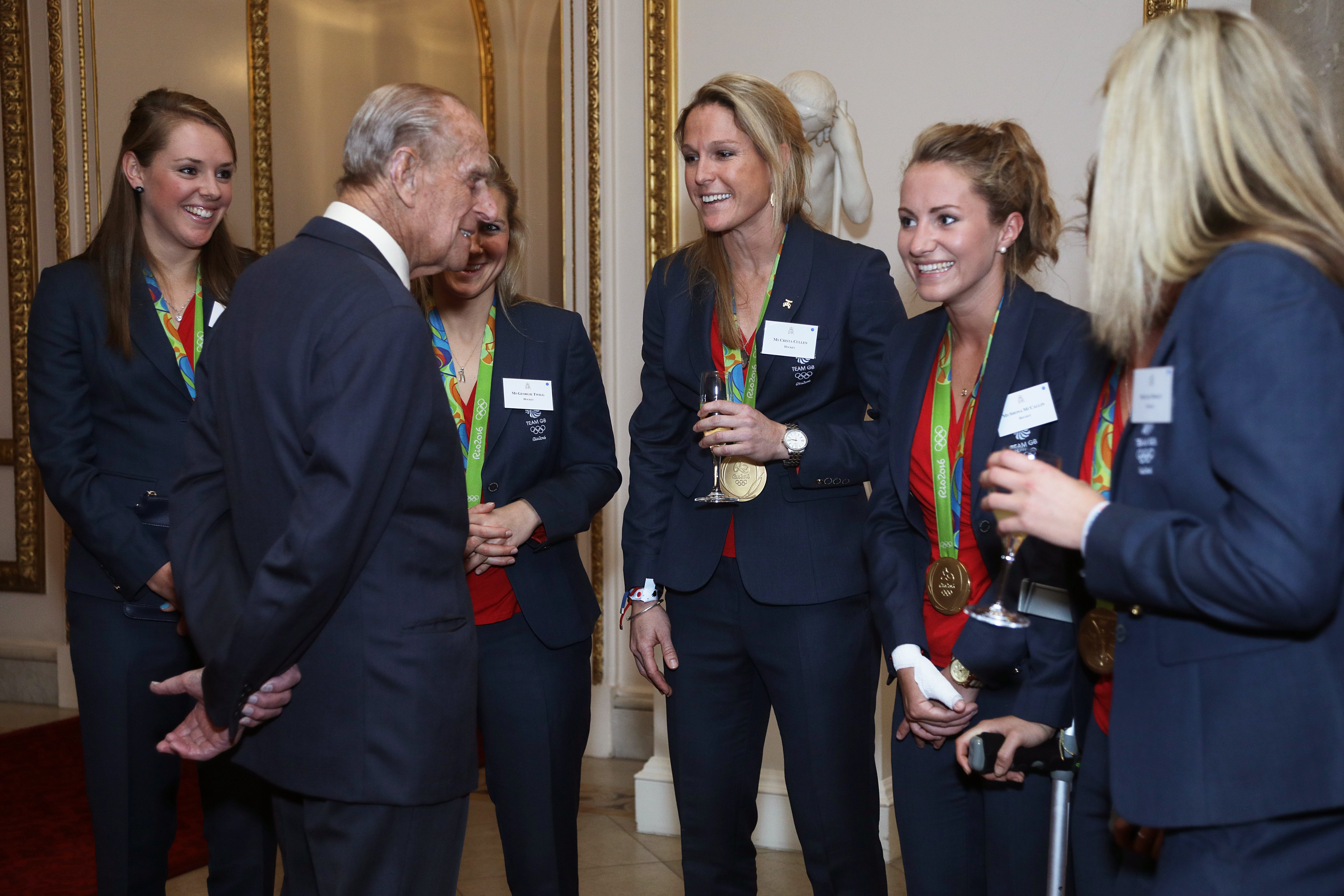 Prince Philip talking to the 2016 England Hockey team at a reception