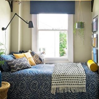 bedroom with bed and white walls