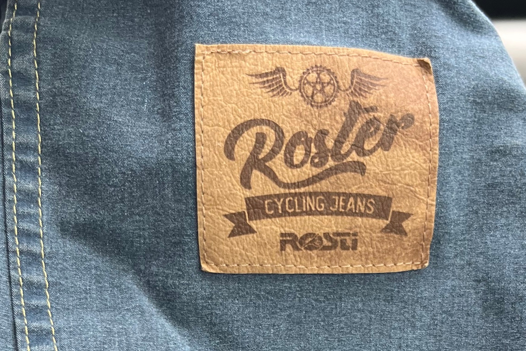 Logo of Rosti's Roster bib jeans